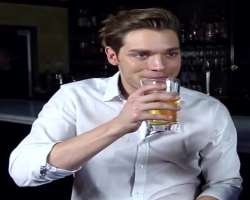Dominic Sherwood consuming alcohol